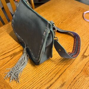 Gray Crossbody Bag with Textured Strap and Tassel